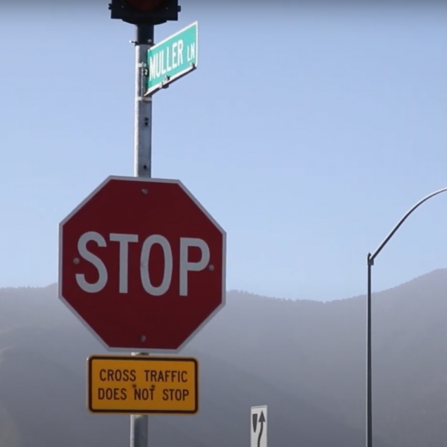 Muller Lane stop sign at Muller Lane and 395